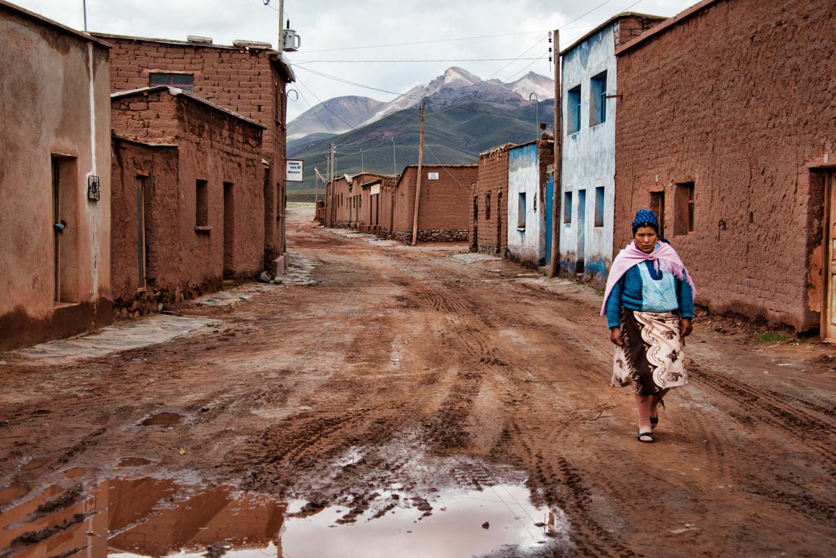 A local woman walks through San Pablo de Lipez in southern Bolivia