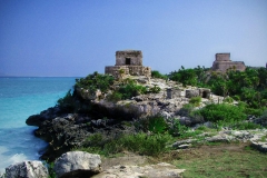 The ancient Tulum ruins sit alongside the ocean in Mexico's Mayan Riviera