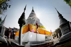 A sunburst behind Wat Phra Singh on a beautiful fall day