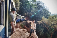 A local train steams through the Matharan hills in central India