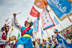 Local dancers perform a Pungmul during an exorcism on a boat in Yeonggwang Gun, South Korea