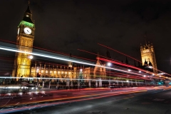 A busy street in front of Big Ben and Parliament in London, England