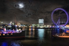 The London Eye and the Thames River on a mostly-clear January evening