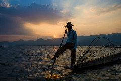 A traditional fisherman shows off his skills on Inle Lake, Myanmar (Burma)