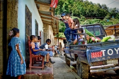 A pickup truck waits to take locals to a funeral in Murra, Nicaragua