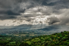 God's Rays shine through a thunderstorm over the Turkish countryside near Tlos