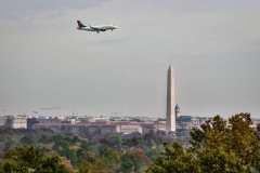 A Delta Airlines flight soars above Washington, DC