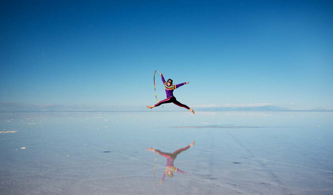 My wife, Carrie leaps across the Sala de Uyuni ... aka, the Bolivian Salt Flats