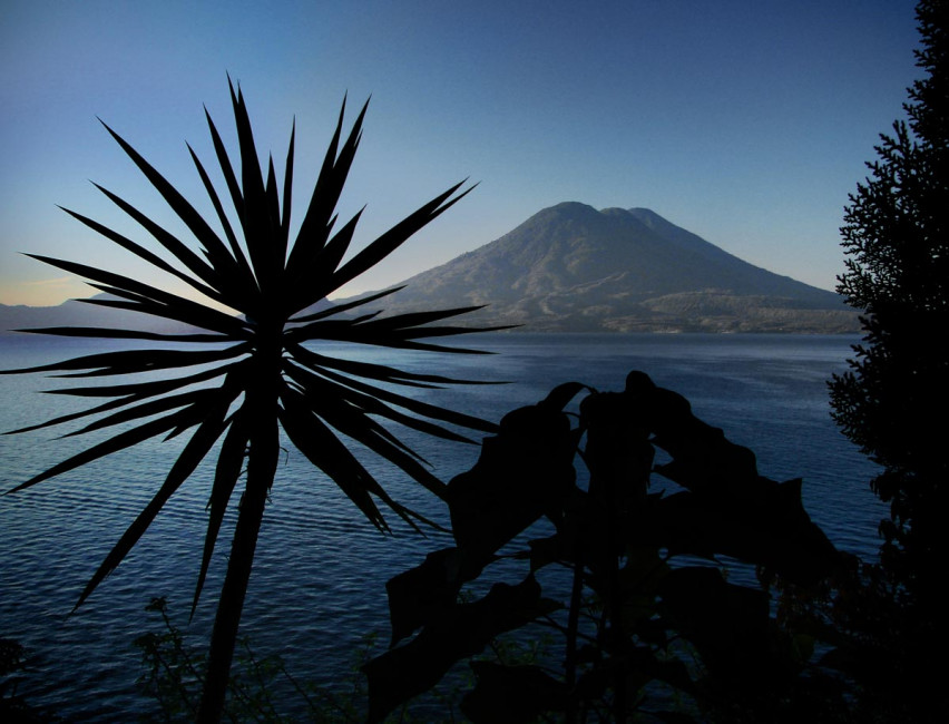Sunrise over the twin volcanos of Lago Atitlan in Guatemala