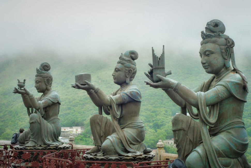 Statues present offerings to the gods on Lantau Island