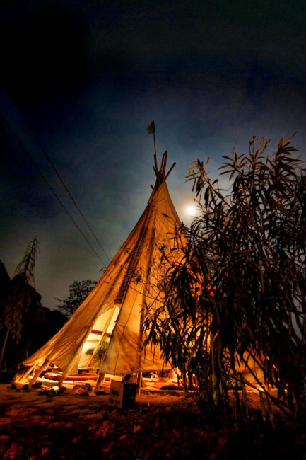 A full moon and a teepee at the Arba Mistika Guesthouse in Hampi, India