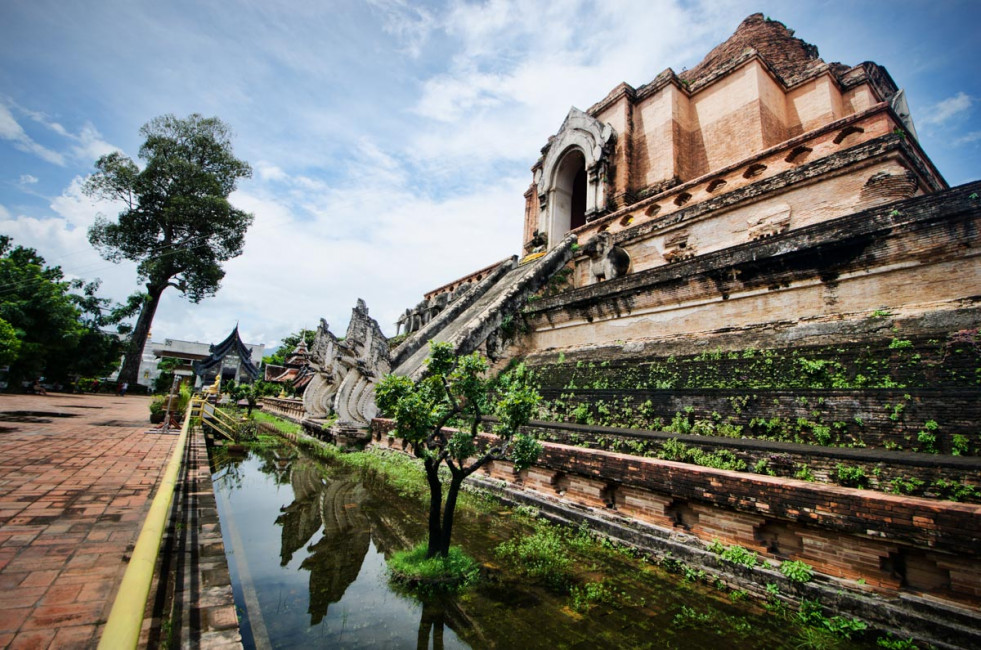 The moat surrounding Wat Chedi Luang often fills up during monsoon season in Chiang Mai