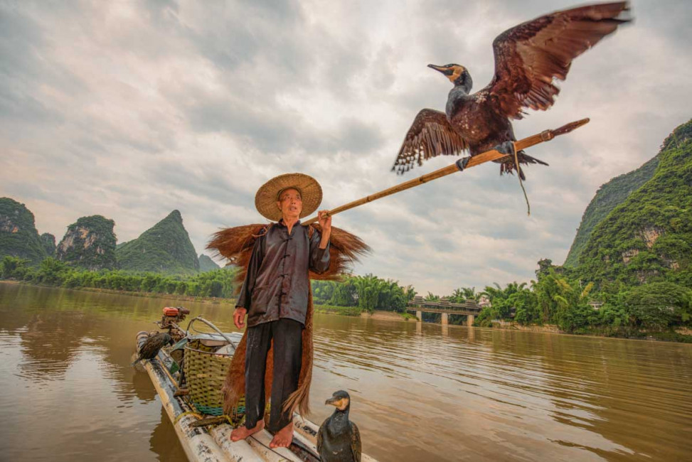 A traditional cormorant fisherman in Yangshou - Guangxi, China