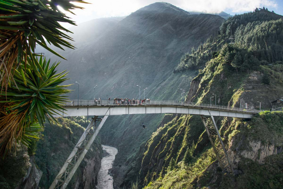 Bungee jumping off a bridge in Banos, Ecuador