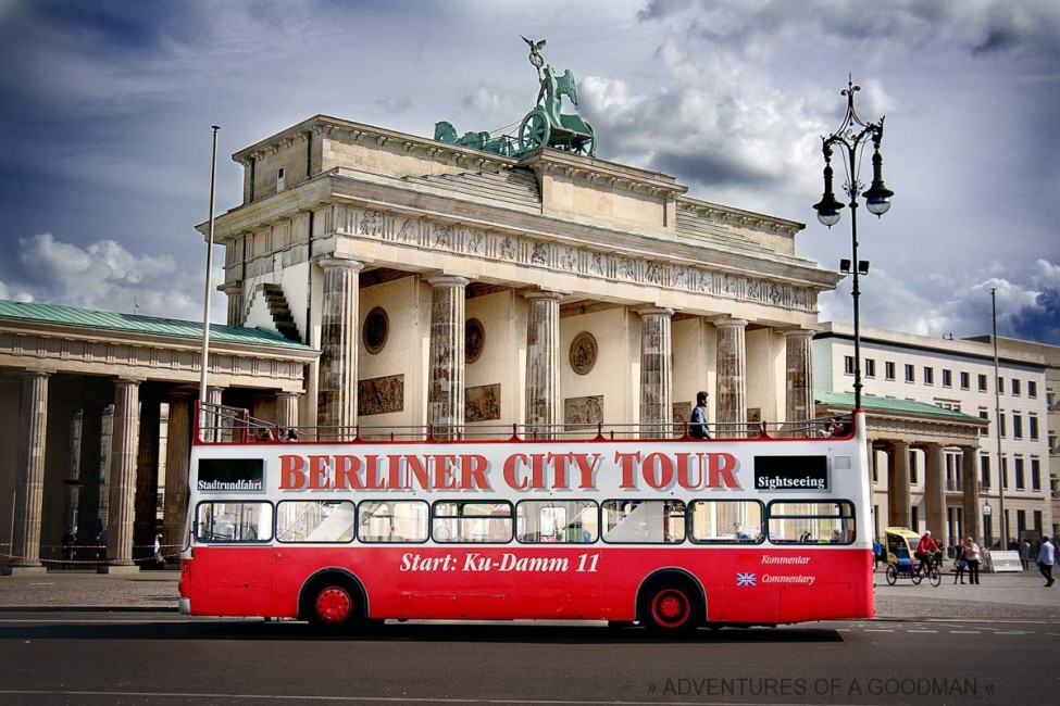 A tour bus parked outside of the Brandenburg Gate in Berlin, Germany