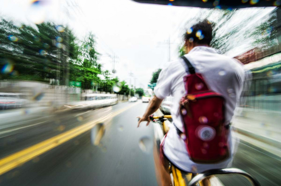 Rain or shine, rickshaw drivers shuttle passengers around Seoul, South Korea