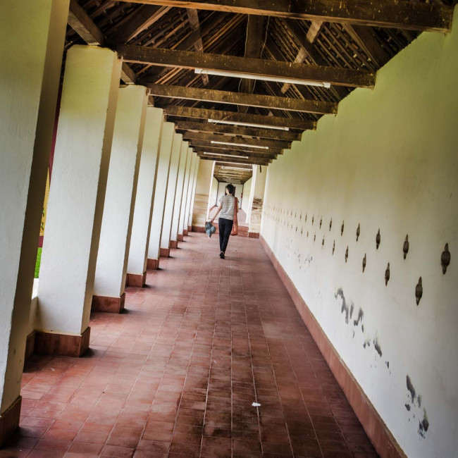 My darling wife, Carrie, walks through the halls of Pha That Luang Temple in Vientiane, Laos