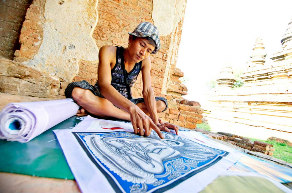 This man tirelessly sells reproductions of paintings to tourists outside the Sein Nyet Pagoda in Bagan, Myanmar