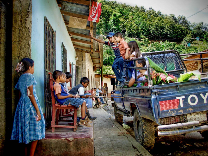 A pickup truck waits to take locals to a funeral in Murra, Nicaragua