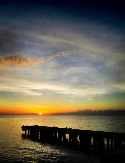 A sunset over the Odiongan dock in the Philippines