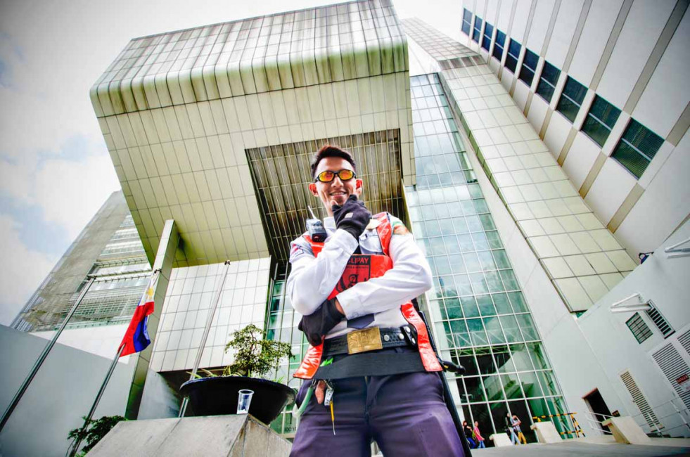 A security guard hams it up for the camera at the De La Salle University in Manila