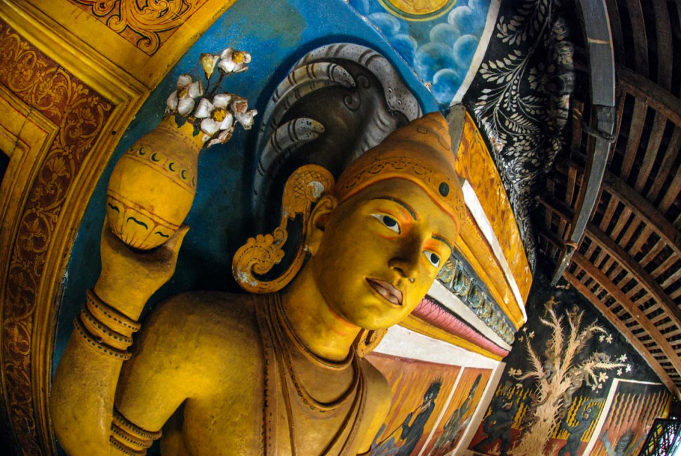 A Buddha statue at the Aluvihara Rock Monastery in Matale, Sri Lanka - one of the Ancient Cities