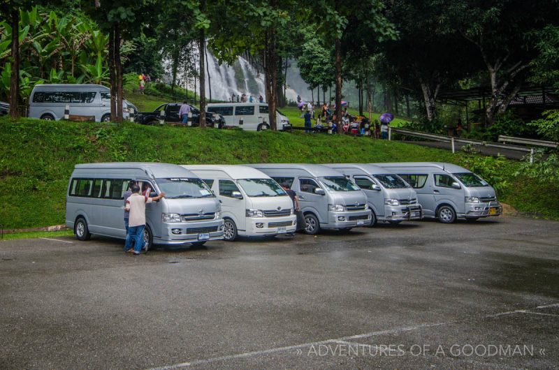 AC tourist buses in the Doi Inthanon National Park parking lot