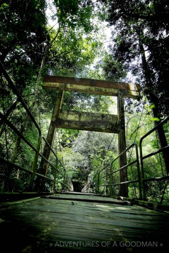 A rickety old wooden bridge leading up to the Lampi Waterfall near Ko Lak, Thailand