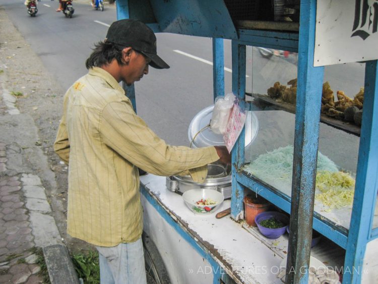 A local vendor makes Bakso on the streets of Ubud, Bali, Indonesia