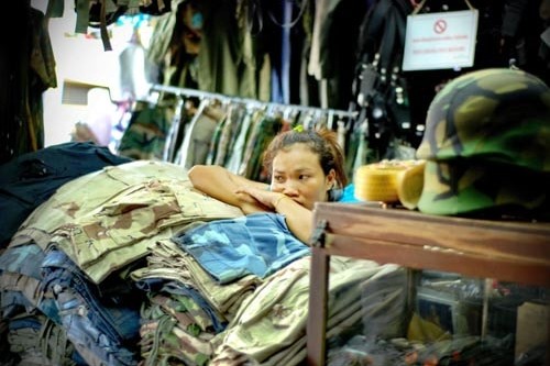 A shopkeeper in a Bangkok market