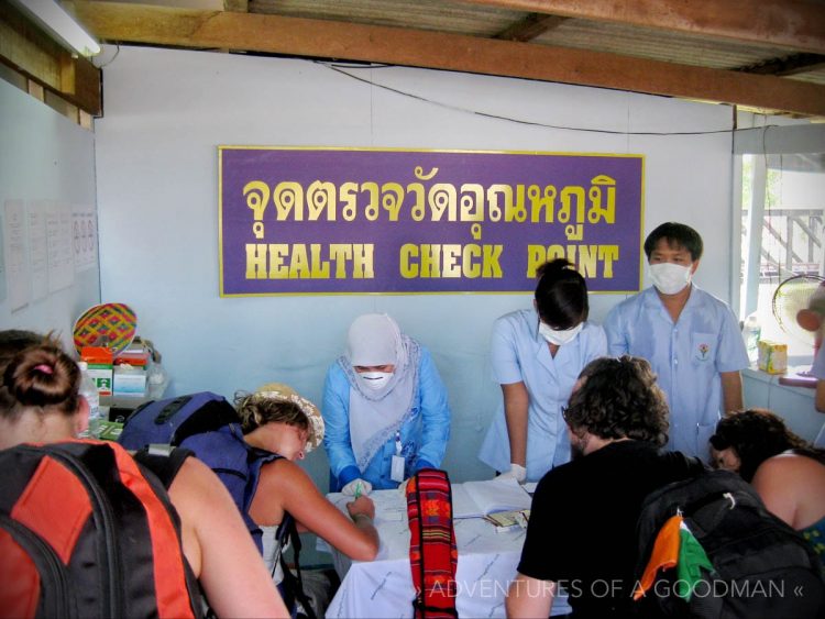 A health check at the Sungai Golok border crossing between Malaysia and Thailand