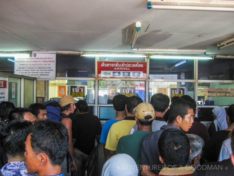 A health check at the Sungai Golok border crossing between Malaysia and Thailand