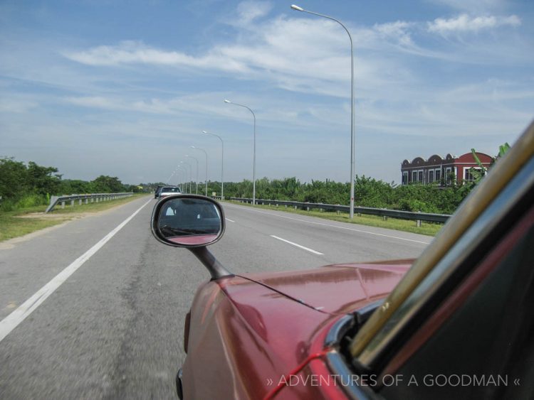 Looking out the window of a Thai taxi