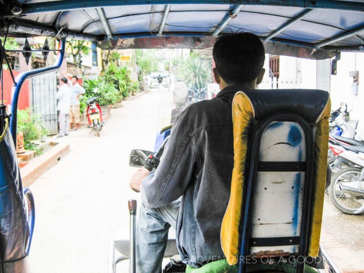 The view from the back seat of a Laotian tuk tuk