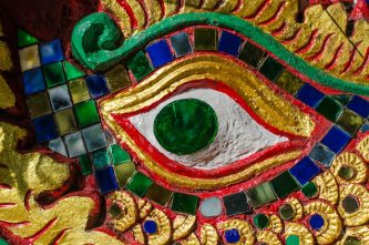 A statue's eye at Wat Doi Suthep - Chiang Mai, Thailand