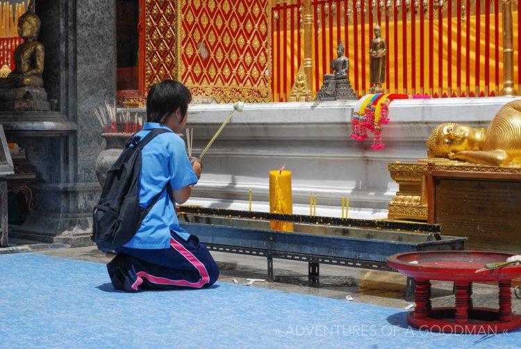 Praying at Wat Doi Suthep in Chiang Mai, Thailand