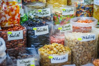 Dried nuts, fruits and candy for sale in the Da Lat market, VietNam