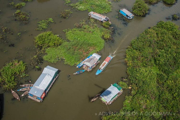 A boat taking tourists to the Floating Village of Kampong Phluk, Cambodia