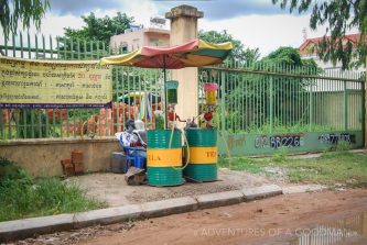 A roadside gas station in Cambodia ... aka, a guy with two barrels of petrol