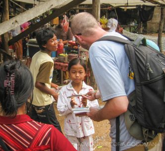 Handing out charity to local students