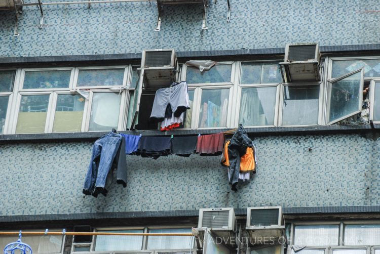 Laundry drying from a guesthouse window in Chungking Mansions