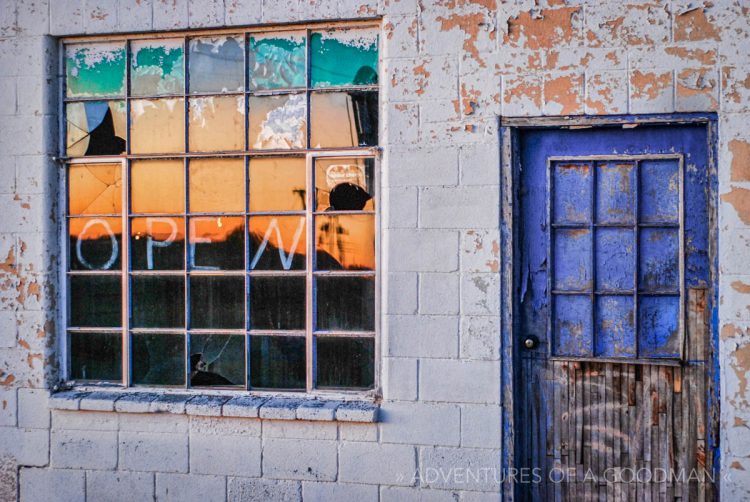 An abandoned gas station window on Route 66 in McLean, Texas