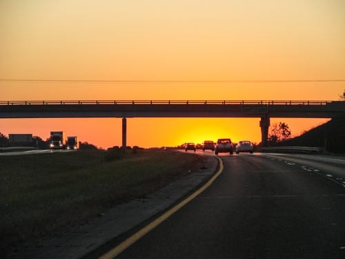 A sunset over the highway