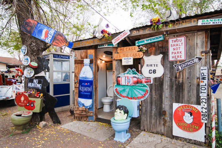 An assortment of old signs and toilet bowls outside Delgadillo's Snow Cap Drive-In, Seligman, Arizona - Route 66