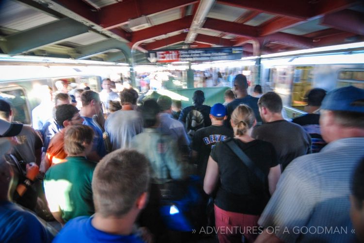 A crowd gets off the 7 train at Willets Point - Shea Stadium