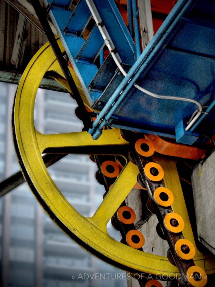 The Tram's brightly colored gears in the Manhattan station