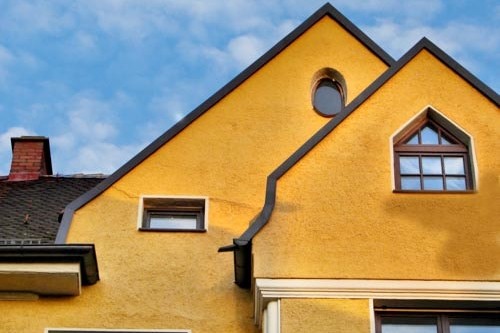 Symmetrical triangles of traditional Bavarian houses in Augsburg, Germany