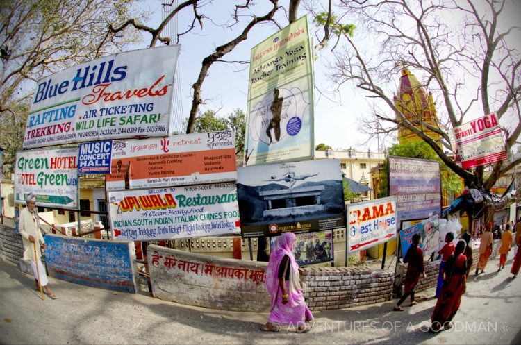 Yoga, hotel and tourism signs by Ram Julah in Rishikesh, India