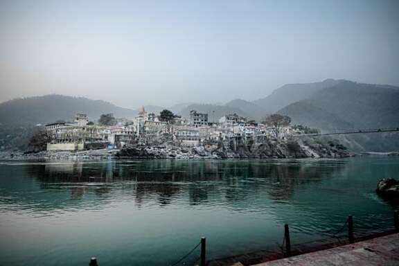 The city of Rishikesh, India, sits alongside the Ganges (Ganga) River