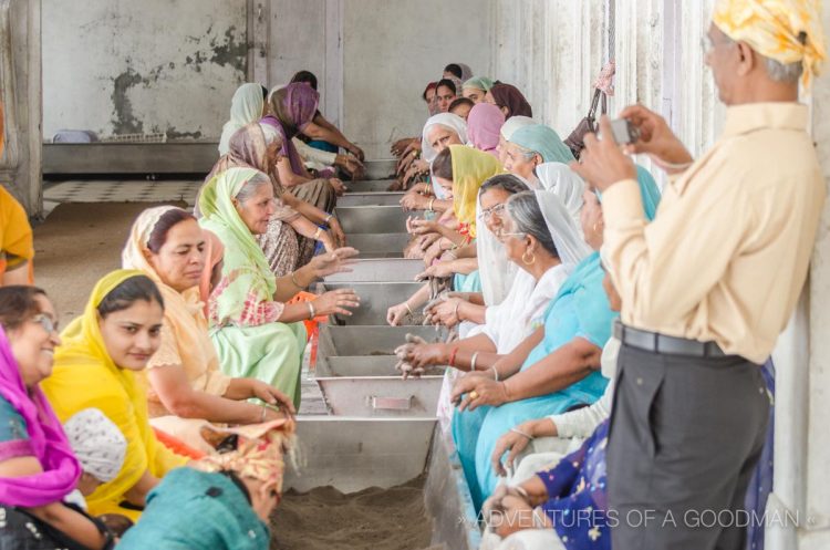 Devotees pray at a shrine at the Sri Harmandir Sahib Golden Temple complex in Amritsar, India